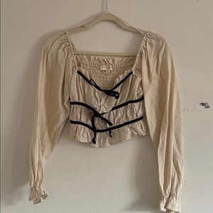 Chic Beige Blouse with Black Trim